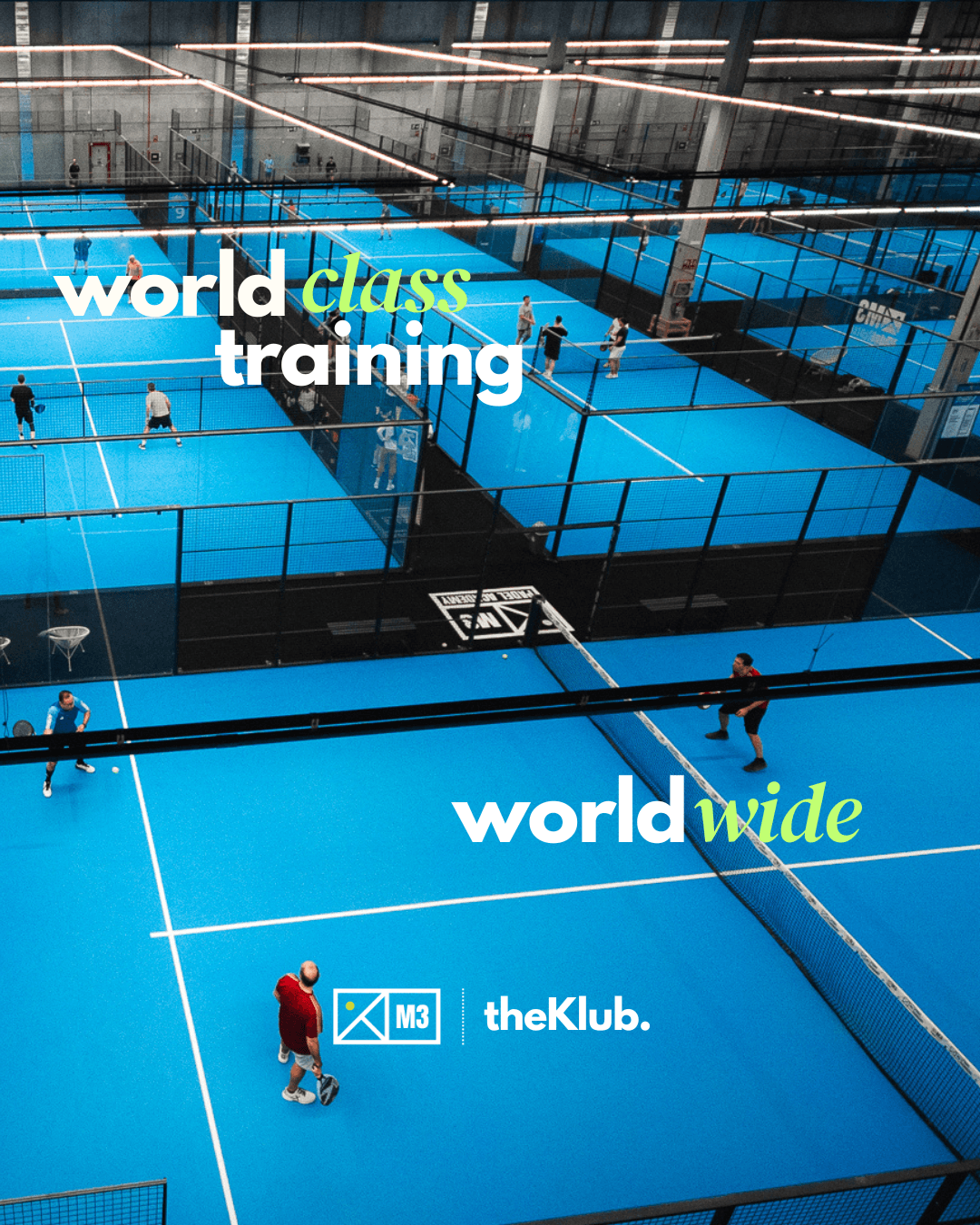 Players training across several blue indoor padel courts at M3 Padel Academy in Madrid